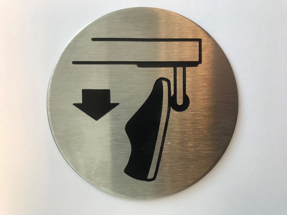 Symboolplaat voetopener Ã¸75mm rvs mat